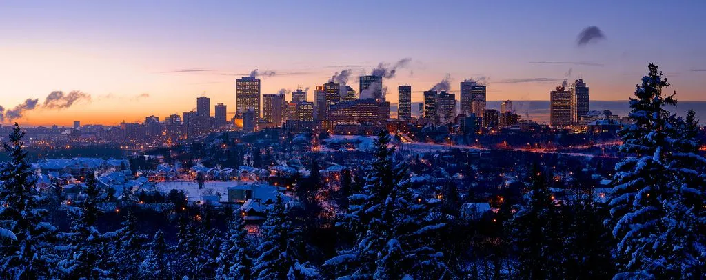 A great skyline shot at dusk, during the winter, displaying Edmonton's snow-covered skyline.  